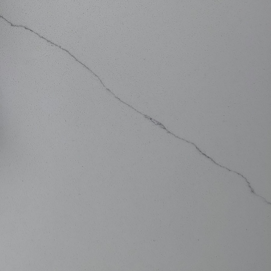 Biały konglomerat kwarcowy z szarą żyłką Calacatta Unique